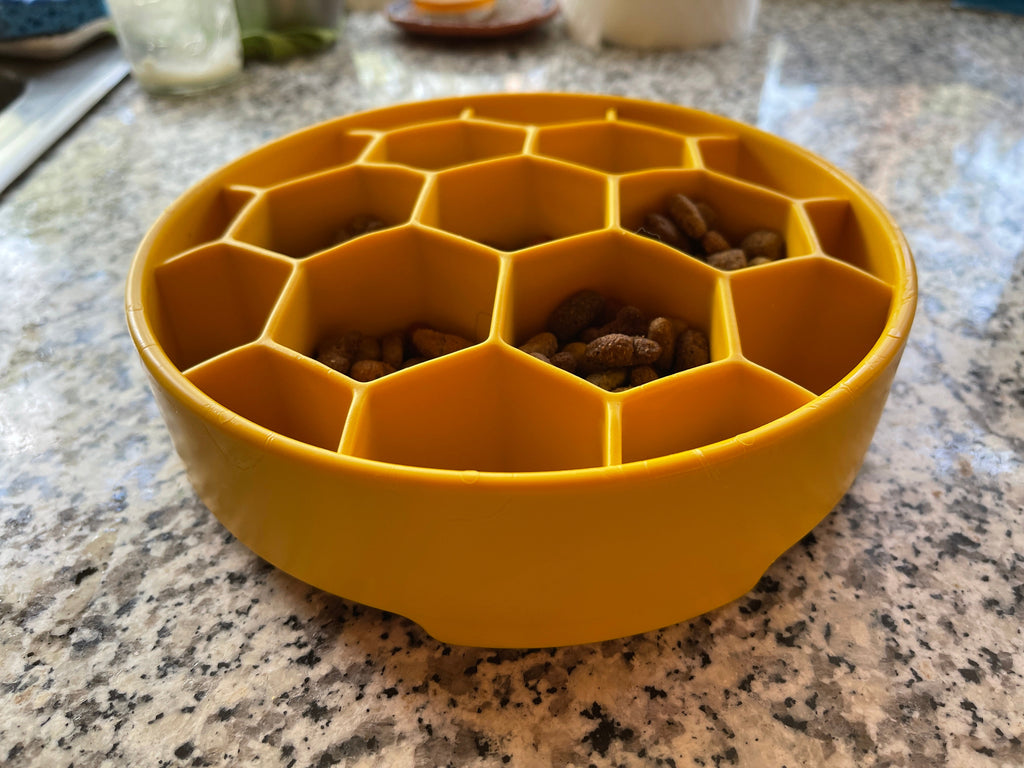 Turn mealtime into enrichment time. The Honeycomb eBowl slows eating by up to 10x, reduces anxiety, and engages foraging instincts. Vet-recommended, dishwasher safe, made in the USA.